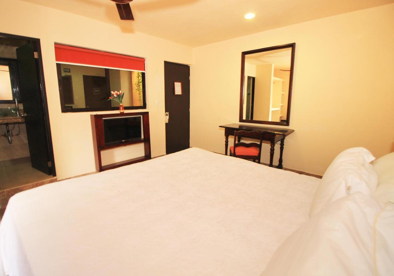 Papagayo Hotel Boutique Playa del Carmen Zewnętrze zdjęcie A room at the hotel